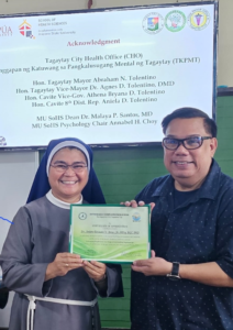Sr. Dina Comilan, sfi, School Principal, personally awarded the certificate of appreciation with much enthusiasm to Dr. Terry Arias.